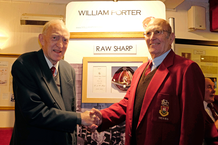 Redruth Club President Derek Collins makes the presentation to Richard Sharp