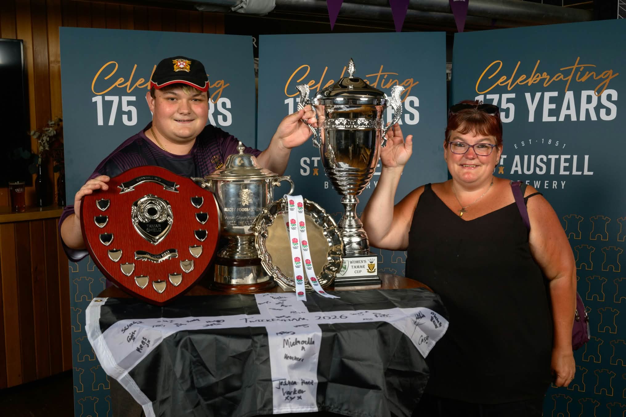 Picture of Luke and Emma Callingham with TASC trophies